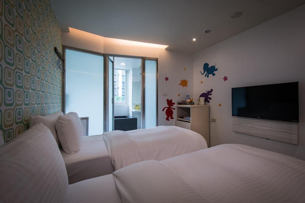 J-Hotel Джиаоси Екстериор снимка